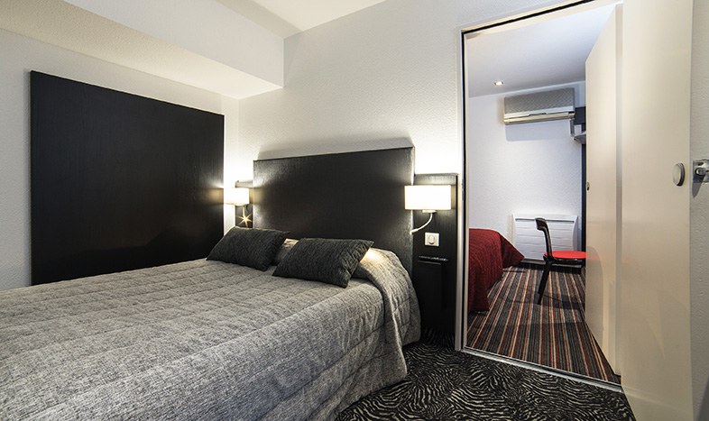 Un ou plusieurs lits dans un hébergement de l’établissement Citotel Stim’Otel